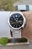 Casio CSISTE94 Kadranı Siyah Kordonu Gümüş Renk Gün ve Takvim Fonksiyonlu Hediye Paketli Erkek Kol Saati thumbnail 2
