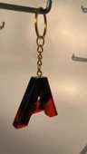 A Harfi Kırmızı Renk Siyah Dumanlı Süs Gold Aksesuarlı Epoksi Anahtarlık El Yapımı Hediyelik thumbnail 8