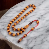 Özel Seri Sürmeli Sistem Püsküllü 12x9 mm Kapsül Kesim Sıkma Kehribar Tesbih thumbnail 1