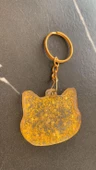 Şeffaf Epoksi İçinde Gold Yıldız Pullu Simli Gold Aksesuarlı Kedi Köpek Başı Anahtarlık El Yapımı Hediyelik thumbnail 2