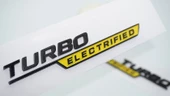 DK Tuning Benz Turbo Electrified Çamurluk Yanı Sarı Logo Amblem thumbnail 1