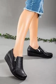 Fermuarlı Cilt Siyah Kadın Günlük Dolgu Taban Ayakkabı thumbnail 1