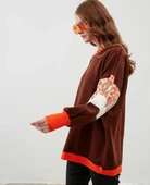 Modatalika Kadın Uzun Kollu Düz ve Kolları Desen Kombinli Oversize Triko Tunik thumbnail 4