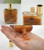 Nuxe Huile Prodigieuse OR Altın Parıltılı Yüz Vücut Saçlar İçin Çok Amaçlı Kuru Yağ 50 ml thumbnail 2