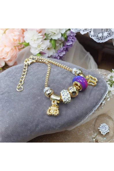 METAL GOLD RENK ÇOK TAŞLI MODEL KADIN BİLEKLİK