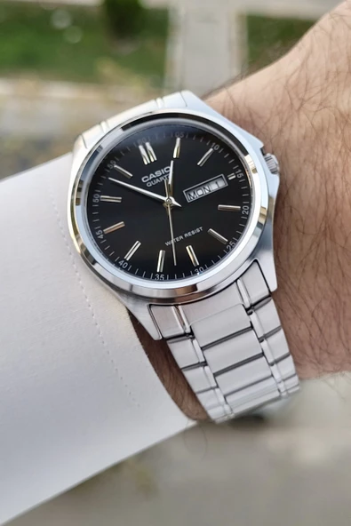 Casio CSISTE94 Kadranı Siyah Kordonu Gümüş Renk Gün ve Takvim Fonksiyonlu Hediye Paketli Erkek Kol Saati ürün görseli 1