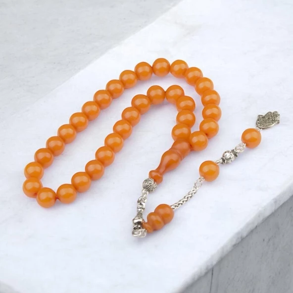 Küre Kesim 10x10 mm Sıkma Kehribar Alpaka Püsküllü Tesbih ürün görseli 1