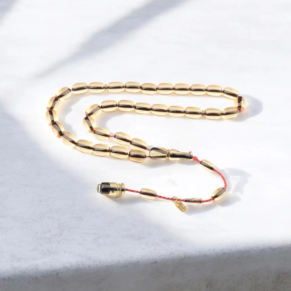 Özel Seri İmzalı Sistem Püsküllü 12x9 mm Kapsül Kesim Ateş Kehribar Tesbih ürün görseli 1