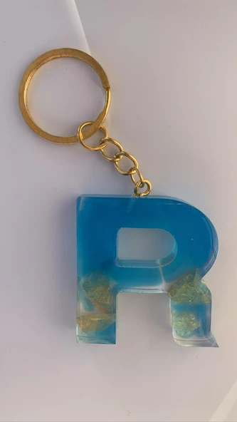Deniz Mavisi Renk Gold Taşlı Gold Aksesuarlı R Harfi Şekil Epoksi Anahtarlık El Yapımı Hediyelik ürün görseli