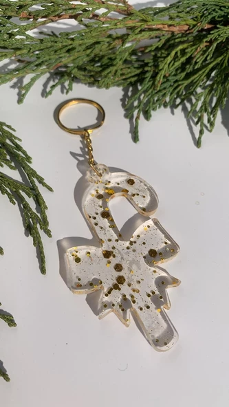 Şeffaf Epoksi İçinde Gold Glitterli Gold Aksesuarlı Kurdele Baston Şeker Anahtarlık El Yapımı Hediyelik ürün görseli