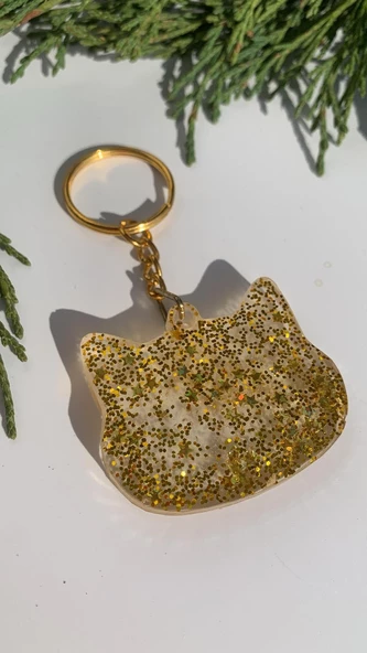 Şeffaf Epoksi İçinde Gold Yıldız Pullu Simli Gold Aksesuarlı Kedi Köpek Başı Anahtarlık El Yapımı Hediyelik ürün görseli