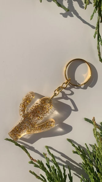 Şeffaf İçinde Gold Simli Gold Aksesuarlı Kaktüs Şekil Epoksi Anahtarlık El Yapımı Hediyelik ürün görseli