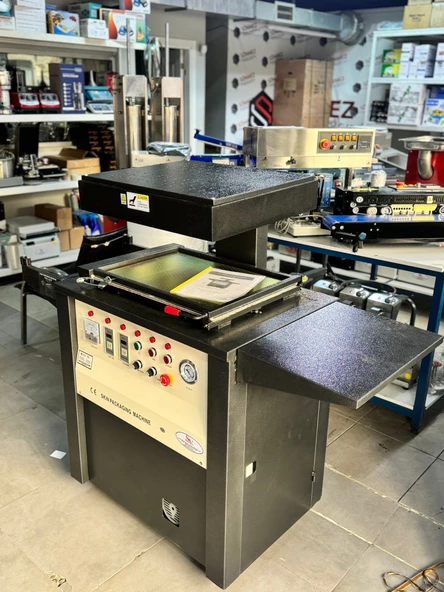 Sönmez Vakum Karton Üzeri Musluk Oyuncak Gümüş Paketleme Makinesi Skinpack Vakum Makinası