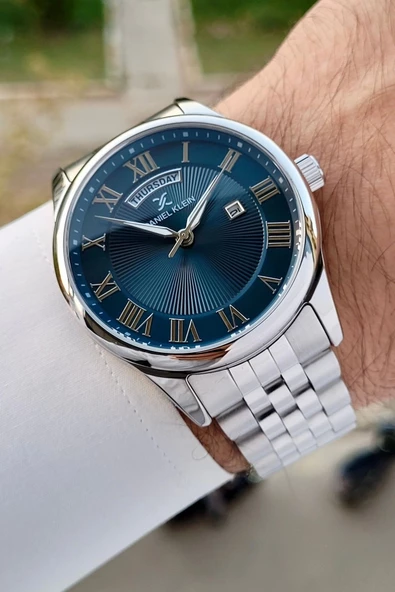 Daniel Klein DKISTE1308 Kadranı Lacivert Kordonu Gümüş Renk Takvim ve Gün Fonksiyonlu Hediye Paketli Erkek Kol Saati ürün görseli 1