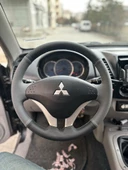 Mitsubishi L200 Araca Özel Dikmeli Direksiyon Kılıfı thumbnail 1