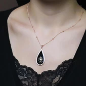 Güneş İşlemeli Damla Gümüş Kolye thumbnail 2