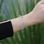 Apm Monaco Model Kayar Halkalı 3 Sıra Zirkon Taşlı 925 Ayar Gümüş Kelepçe thumbnail 2