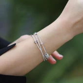 Apm Monaco Model Kayar Halkalı 3 Sıra Zirkon Taşlı 925 Ayar Gümüş Kelepçe thumbnail 1