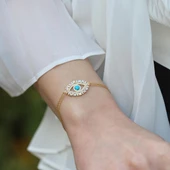 Göz Modeli Turkuaz Taşlı Gold Kaplama Gümüş Bileklik thumbnail 1