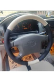 DİKİŞLİ DİREKSİYON KILIFI BEJ/SİYAH DERİ SİYAH DİKİŞLİ TOYOTA COROLLA İÇİN thumbnail 1