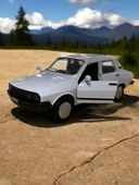 Metal Çek Bırak Toros Araba Beyaz Sesli ve Işıklı ( 1/36 Ölçek ) thumbnail 1