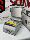 Sönmez Vakum Karton Tabak Yapıştırma Makinesi Su Böreği Döner Paketleme Makinası thumbnail 1