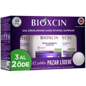 Bioxcin Saç Dökülmesine Karşı Siyah Sarımsak Şampuanı 3 x 300 ml 3 Al 2 Öde - 1