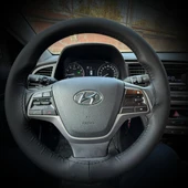 DİKİŞLİ DİREKSİYON KILIFI İTHAL SİYAH DERİ SİYAH DİKİŞLİ HYUNDAİ ELENTRA İÇİN thumbnail 1