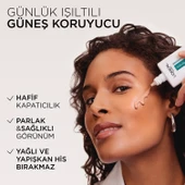 L'Oréal Paris Bright Reveal Spf 50+ Koyu Leke Karşıtı Renkli Fluid Günlük Yüz Güneş Kremi 50 ml - Medium - 2
