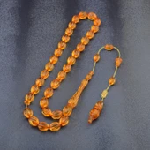 Sistem Püsküllü 11x8mm Oyma İşçilikli İmzalı Ateş Kehribar Tesbih thumbnail 2