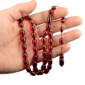 Sistem Püsküllü 11x8mm Kapsül Kesim İmzalı Ateş Kehribar Tesbih thumbnail 1