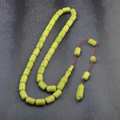 Sistem Püsküllü 11x7 mm İmzalı Sıkma Kehribar Tesbih thumbnail 2