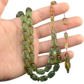 Sistem Püsküllü 13x8 mm Oyma İşçilikli İmzalı Ateş Kehribar Tesbih thumbnail 1