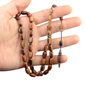 Kapsül Kesim 11x7 mm Kafur Ağacı Sistem Püsküllü Tesbih thumbnail 1