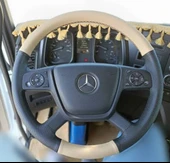 DİKİŞLİ DİREKSİYON KILIFI BEJ DERİ NOKTALI DERİ SİYAH DİKİŞLİ MERCEDES TIR KAMYON İÇİN thumbnail 1