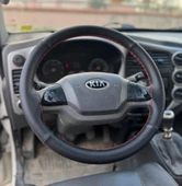 DİKİŞLİ DİREKSİYON KILIFI SİYAH DERİ NOKTALI DERİ KIRMIZI DİKİŞLİ KİA BONGO İÇİN thumbnail 1