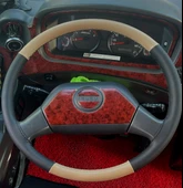 DİKİŞLİ DİREKSİYON KILIFI BEJ DERİ SİYAH DERİ SİYAH DİKİŞLİ ISUZU NOVO LUX 2013 KASA İÇİN thumbnail 1