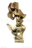 KİTAP OKUYAN ÇİFT YÜZ BİBLO 35CM - 1