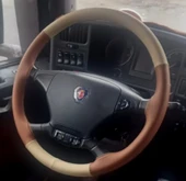 DİKİŞLİ DİREKSİYON KILIFI AÇIK BEJ DERİ TABA DERİ SİYAH DİKİŞLİ SCANİA (2010 KASA) İÇİN thumbnail 1