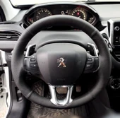 DİKİŞLİ DİREKSİYON KILIFI SİYAH DERİ NOKTALI DERİ SİYAH DİKİŞLİ PEUGEOT 208 İÇİN thumbnail 1