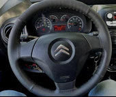 DİKİŞLİ DİREKSİYON KILIFI NOKTALI DERİ SİYAH DERİ SİYAH DİKİŞLİ 2011 KASA CİTROEN NEMO İÇİN thumbnail 1