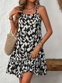 Kadın omuzdan bağlamalı desenli fırfırlı süprem elbise - 2