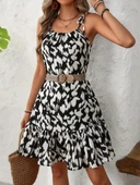 Kadın omuzdan bağlamalı desenli fırfırlı süprem elbise - 5