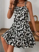 Kadın omuzdan bağlamalı desenli fırfırlı süprem elbise - 1