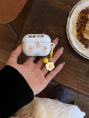 Sevimli Çizgi Film Ayı AirPods Koruyucu Kılıf - Apple AirPods Pro - Mavi Kahverengi Ayı + Yumurta Sarısı Zil Kolye - 10