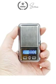 Premium Pilli Mini Hassas Cep Terazisi Tartı 200 g Kapasite 0.01 g Kuyumcu Tartısı Kılıflı Kalibre thumbnail 2