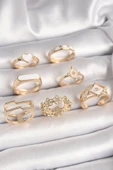 KUZGUN ONLİNE SHOP Pirinç Gold Renk Beyaz Mineli Kalp Zirkon Taşlı Çiçek Detay Kadın Yüzük Kombini - Lisinya - 1