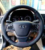 DİKİŞLİ DİREKSİYON KILIFI SİYAH DERİ NOKTALI DERİ KIRMIZI DİKİŞLİ HYUNDAİ ELENTRA (FOTODAKİ) İÇİN thumbnail 1