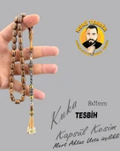 GÜMÜŞ İŞLEMELİ VE PÜSKÜLLÜ MERT AKTAŞ KUKA KAPSÜL KESİM 8X11 - 1