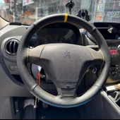 DİKİŞLİ DİREKSİYON KILIFI SİYAH DERİ NOKTALI DERİ SARI YÜZÜK SARI DİKİŞLİ PEUGEOT BİPPER İÇİN thumbnail 1